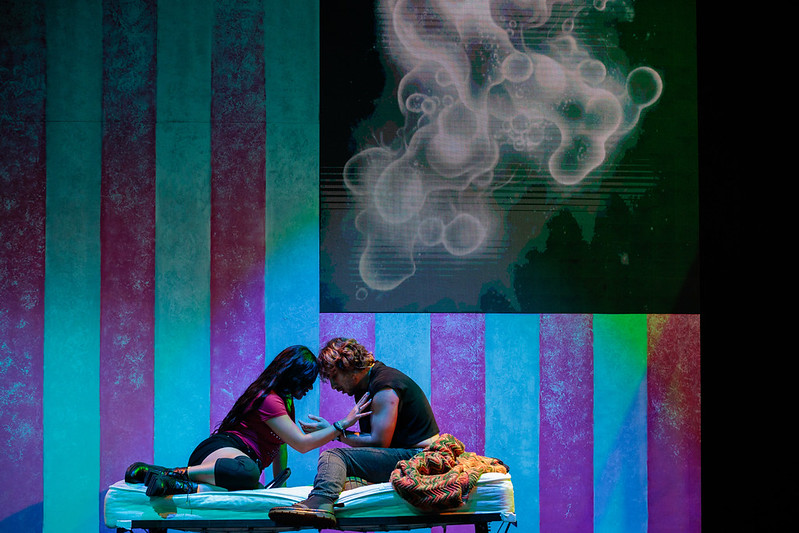 Johnny and Whatshername share a tender moment onstage.