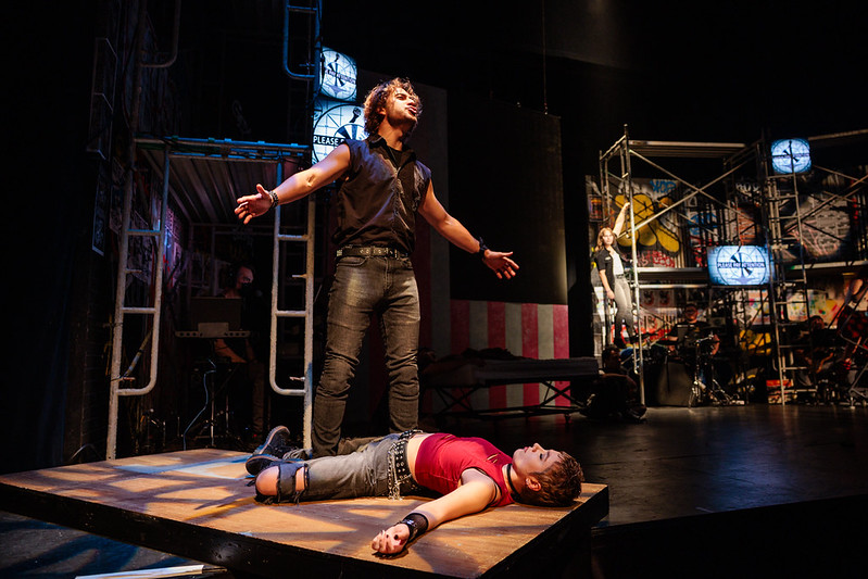 St. Jimmy looms over a fallen character on the platform set.